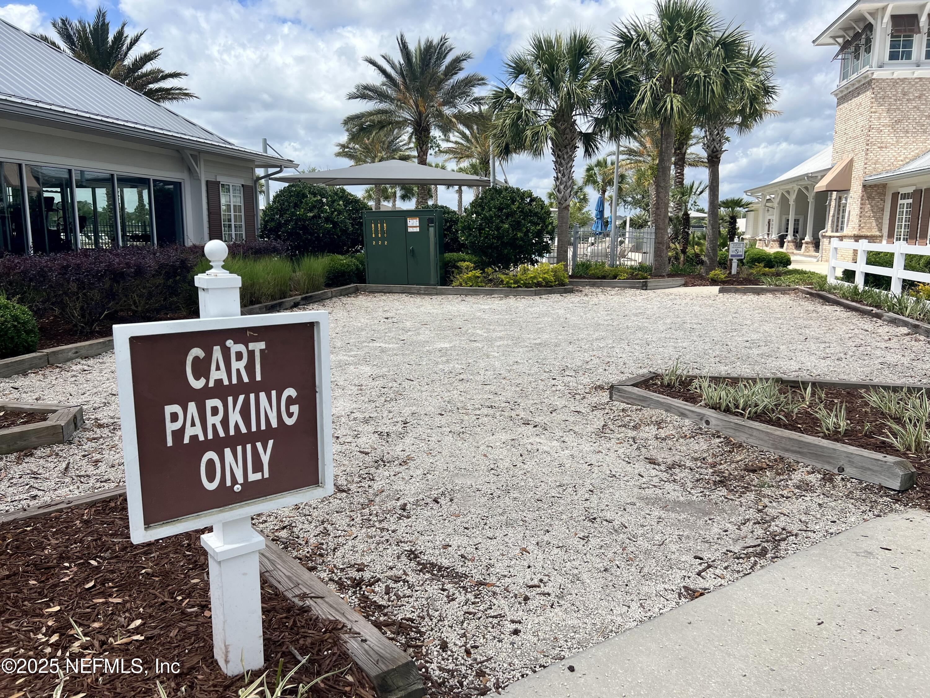 128 Ash Breeze Cove St. Augustine, FL 32095 - Photo 57 of 57 a sign board with parking space