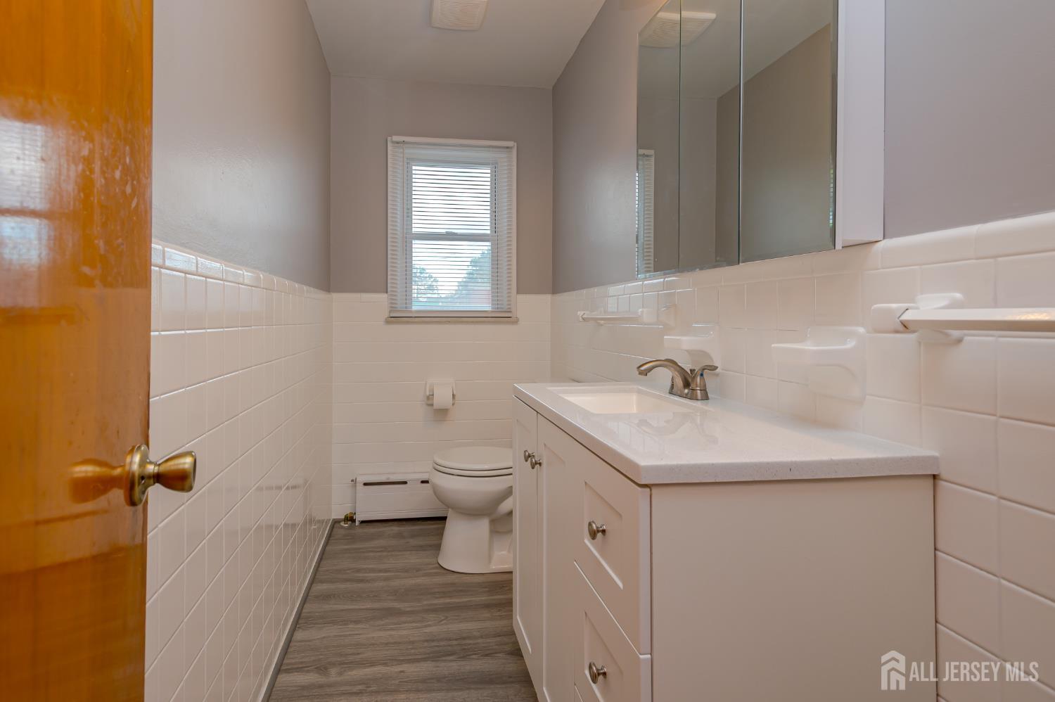 10 Mary Avenue Fords, NJ 08863 - Photo 12 of 23 a bathroom with a sink toilet and shower