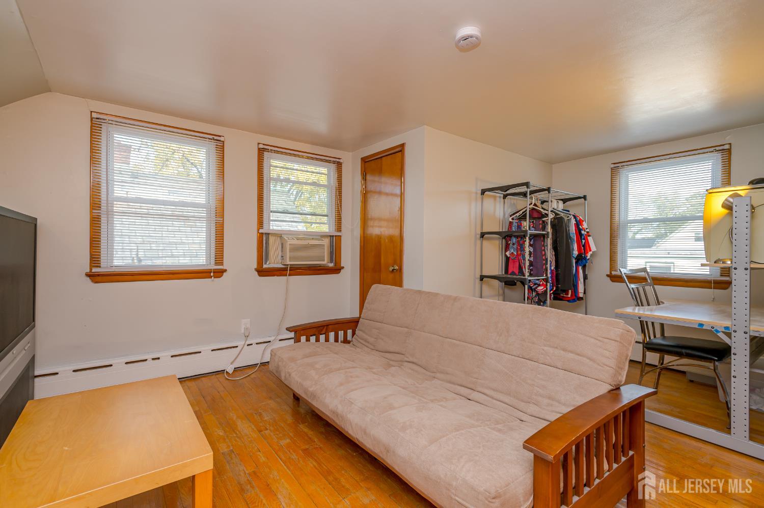 10 Mary Avenue Fords, NJ 08863 - Photo 16 of 23 a bed room with a bed and a window