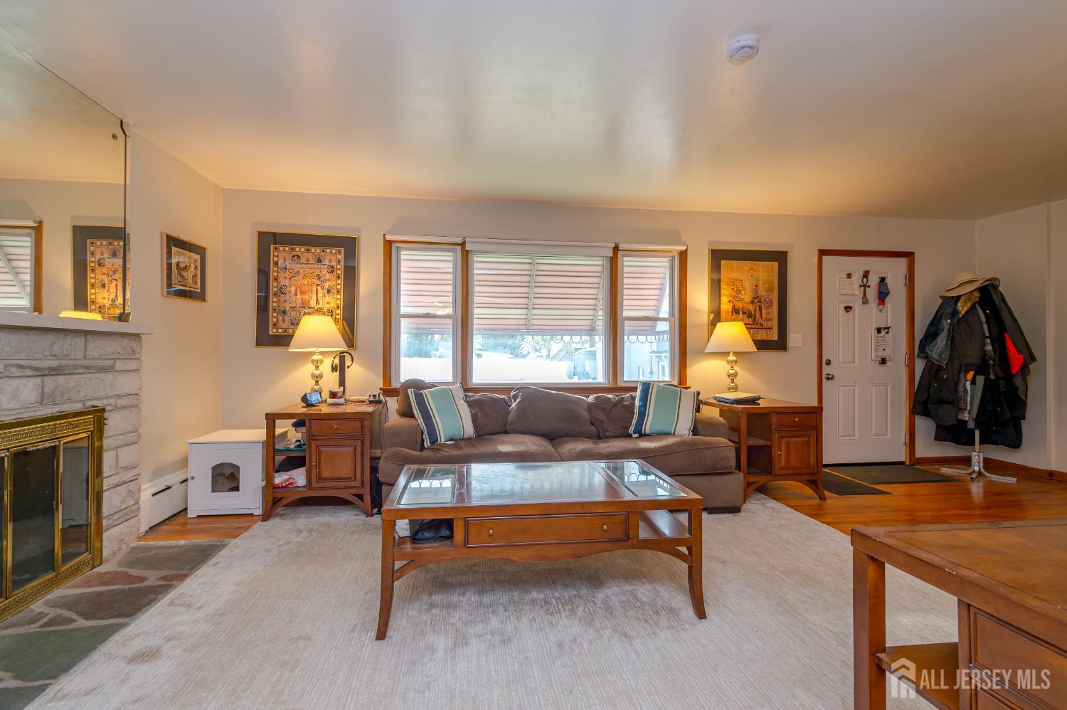 10 Mary Avenue Fords, NJ 08863 - Photo 5 of 23 a living room with furniture and a fireplace
