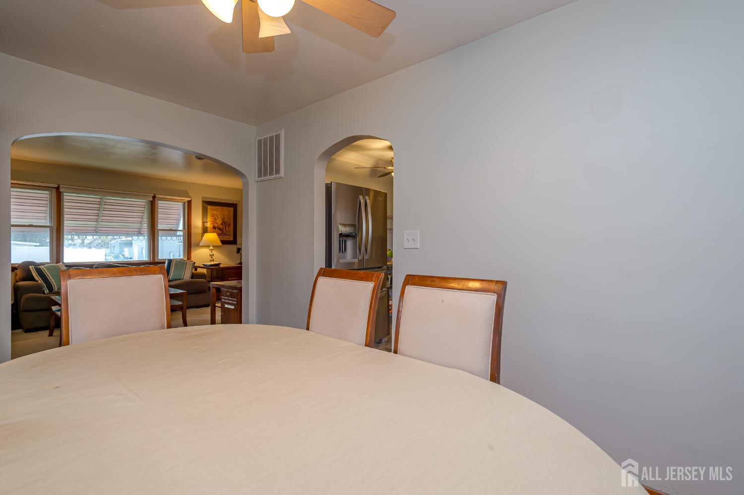 10 Mary Avenue Fords, NJ 08863 - Photo 8 of 23 a bedroom with a large bed and a chandelier