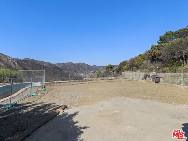 a view of a lake with a mountain