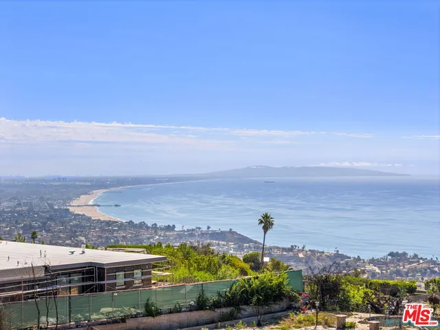 a view of a city with an ocean