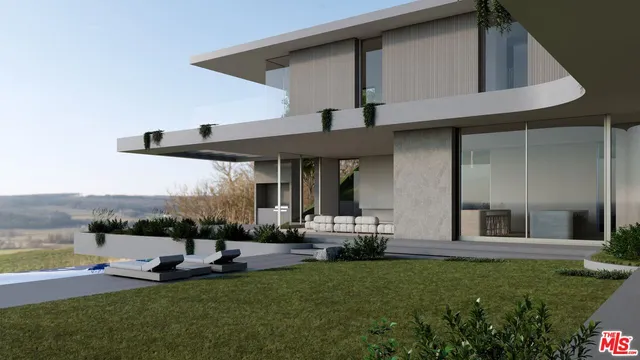 a view of a house with sitting area and garden