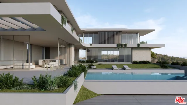 a view of a building with potted plants and palm trees