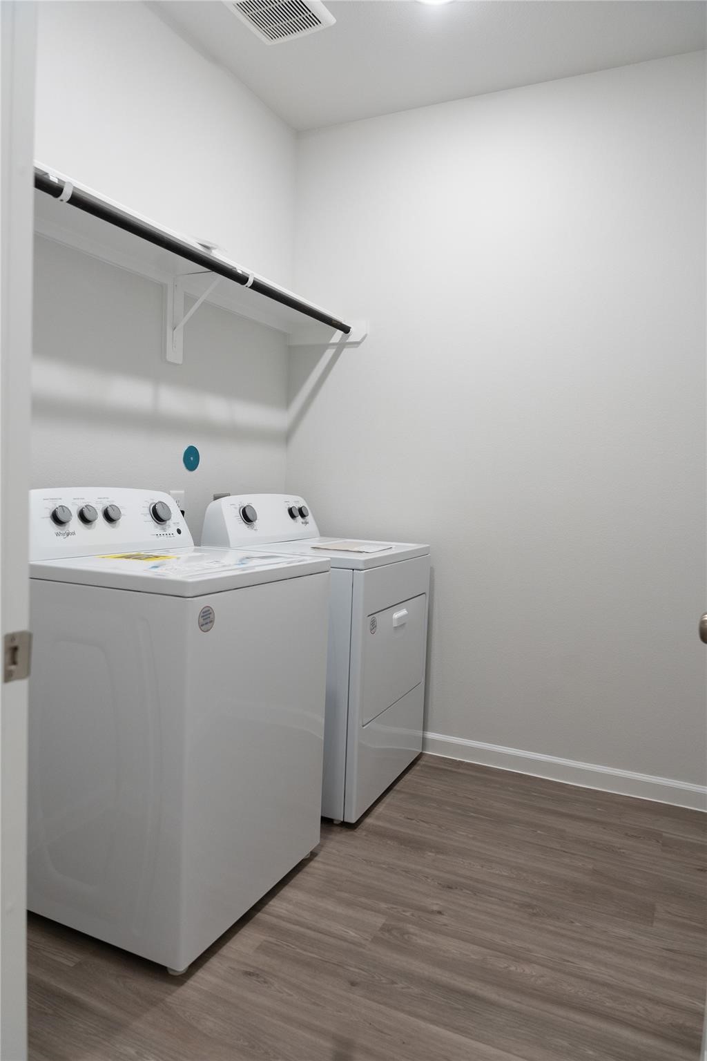 64 Valiant Ridge Trail Magnolia, TX 77354 - Photo 17 of 33 a utility room with dryer and washer