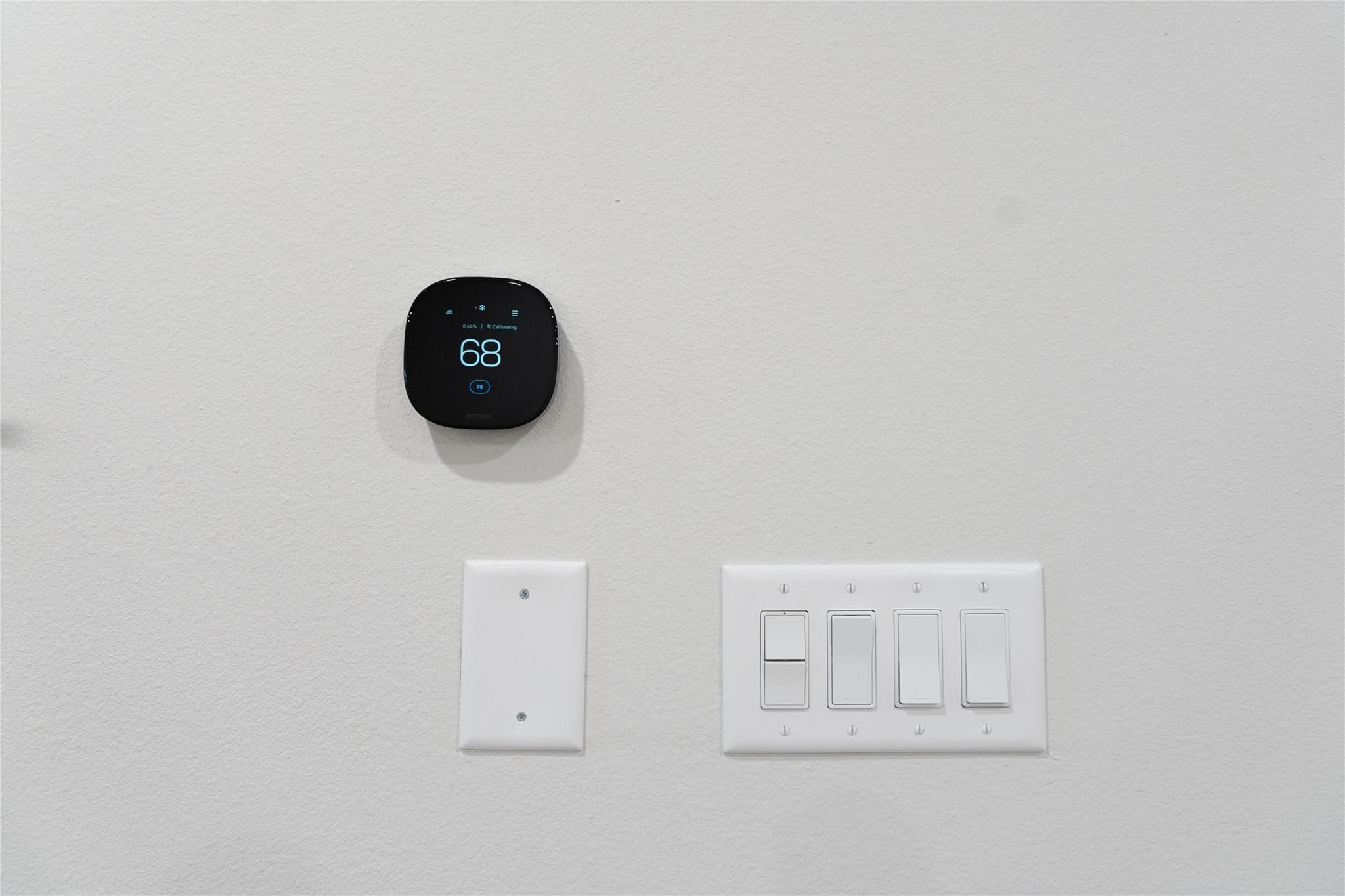 64 Valiant Ridge Trail Magnolia, TX 77354 - Photo 18 of 33 a view of a cabinet with a black and white wall