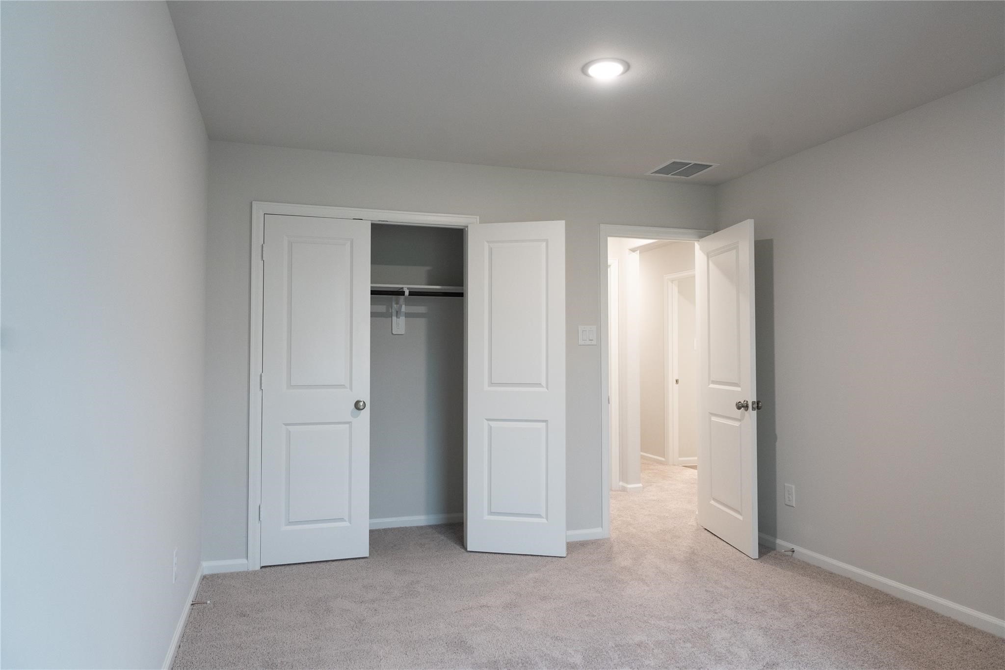 64 Valiant Ridge Trail Magnolia, TX 77354 - Photo 23 of 33 an empty room with closet area