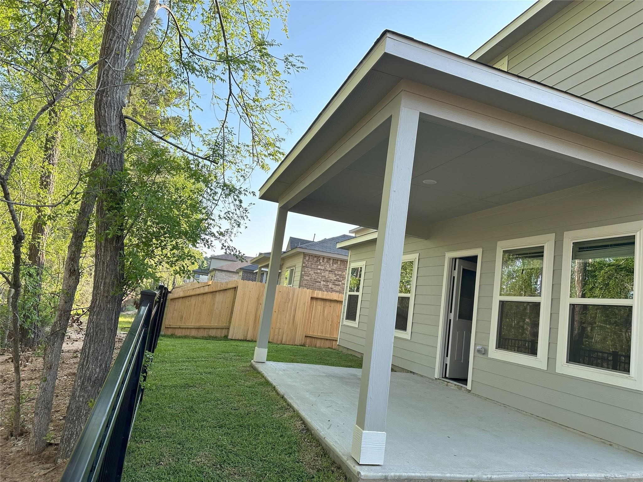 64 Valiant Ridge Trail Magnolia, TX 77354 - Photo 33 of 33 a house view with a outdoor space