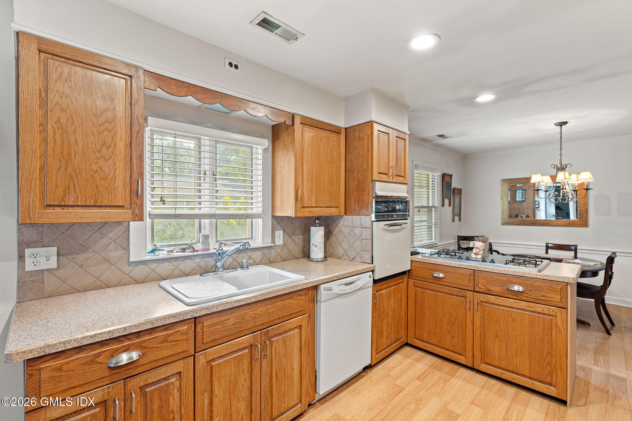 10 Homestead Road Greenwich, CT 06831 - Photo 7 of 14 Kitchen to Breakfast Rm