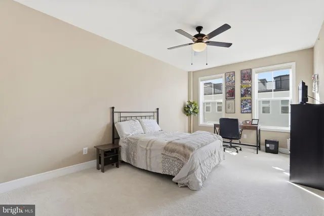 a bathroom with a tub a sink and a shower