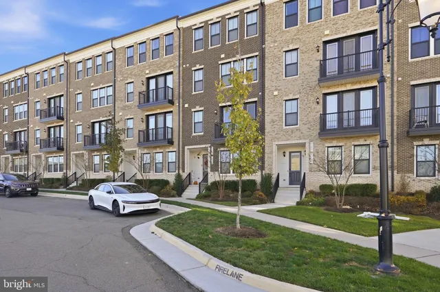 a view of a hallway with washer and dryer