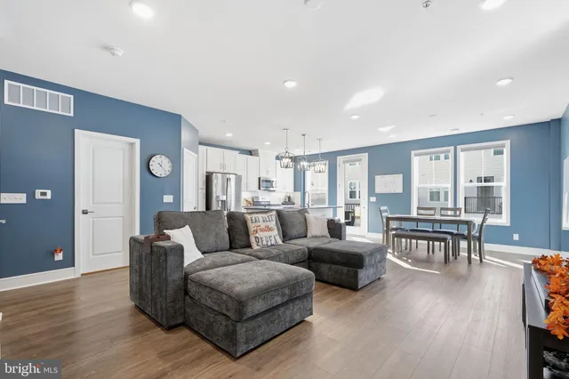 a front view of a building with many windows