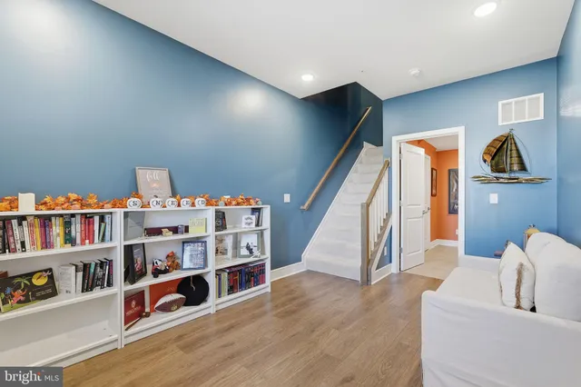 a view of a livingroom with furniture and window