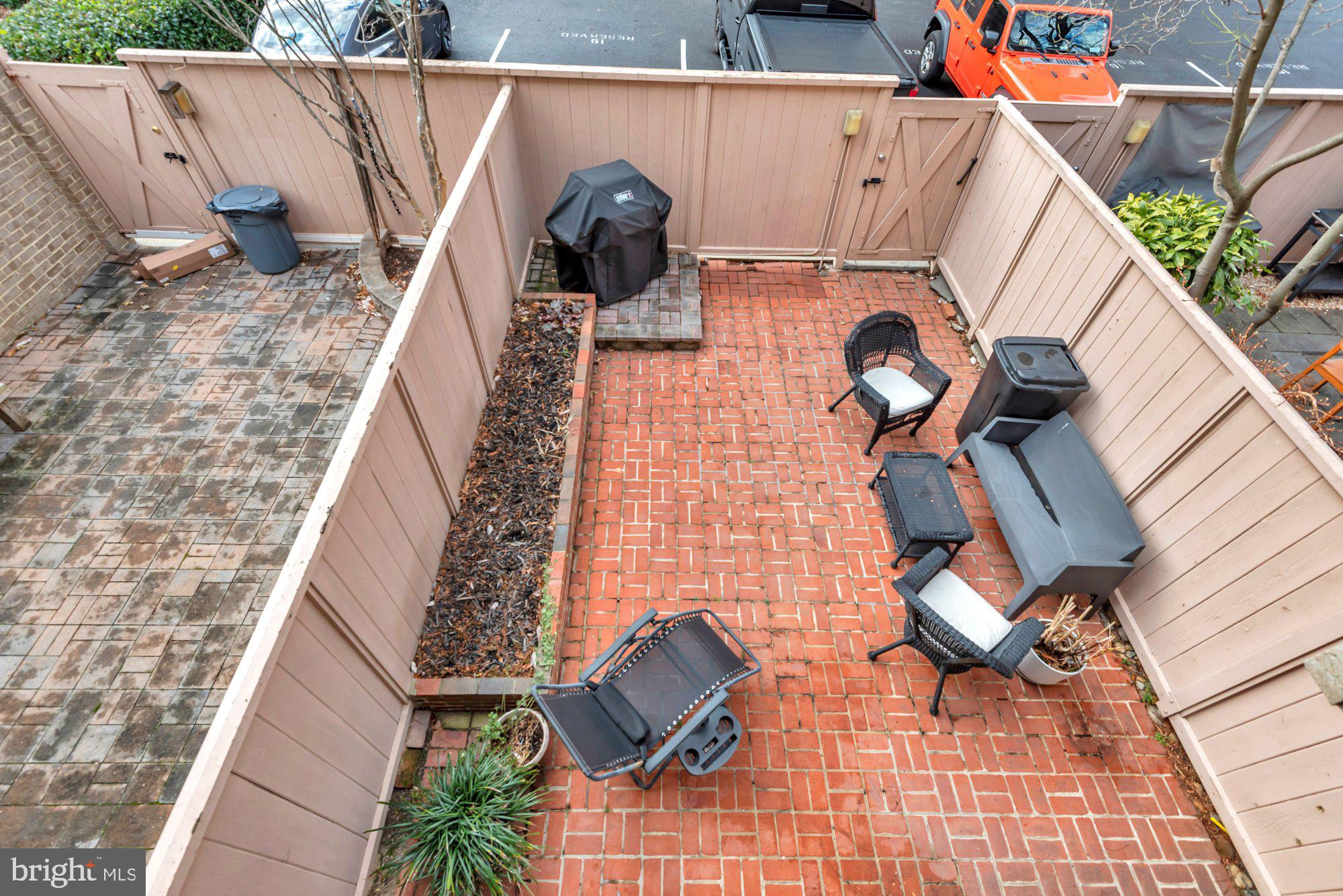 1263 Delaware Avenue Southwest, Unit 53 Washington, DC 20024 - Photo 21 of 65 View of Private Patio from Primary Bedroom