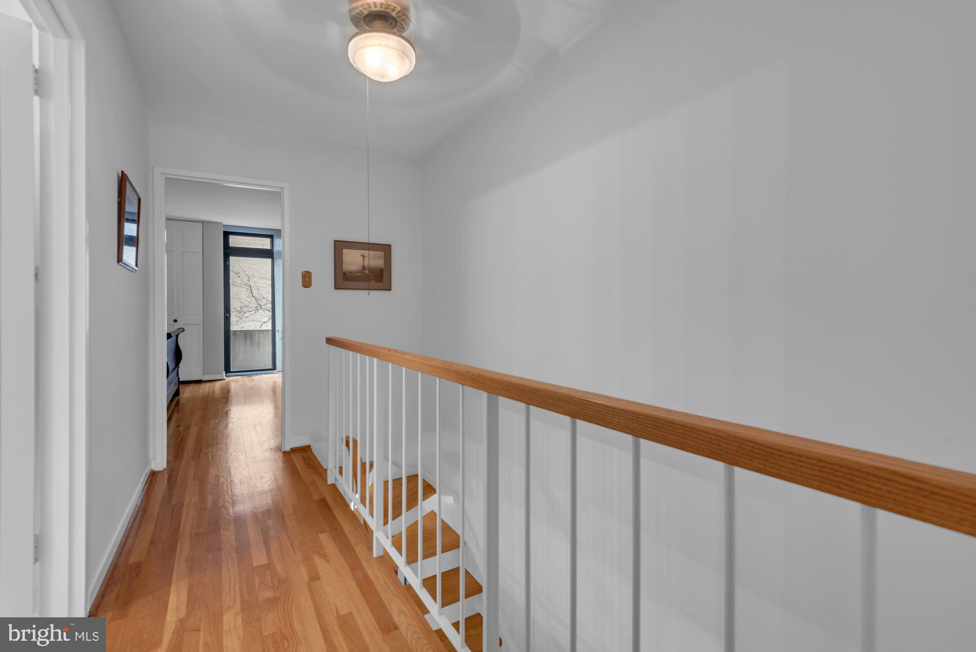 1263 Delaware Avenue Southwest, Unit 53 Washington, DC 20024 - Photo 25 of 65 Wood Floors in 2nd Floor Hallway