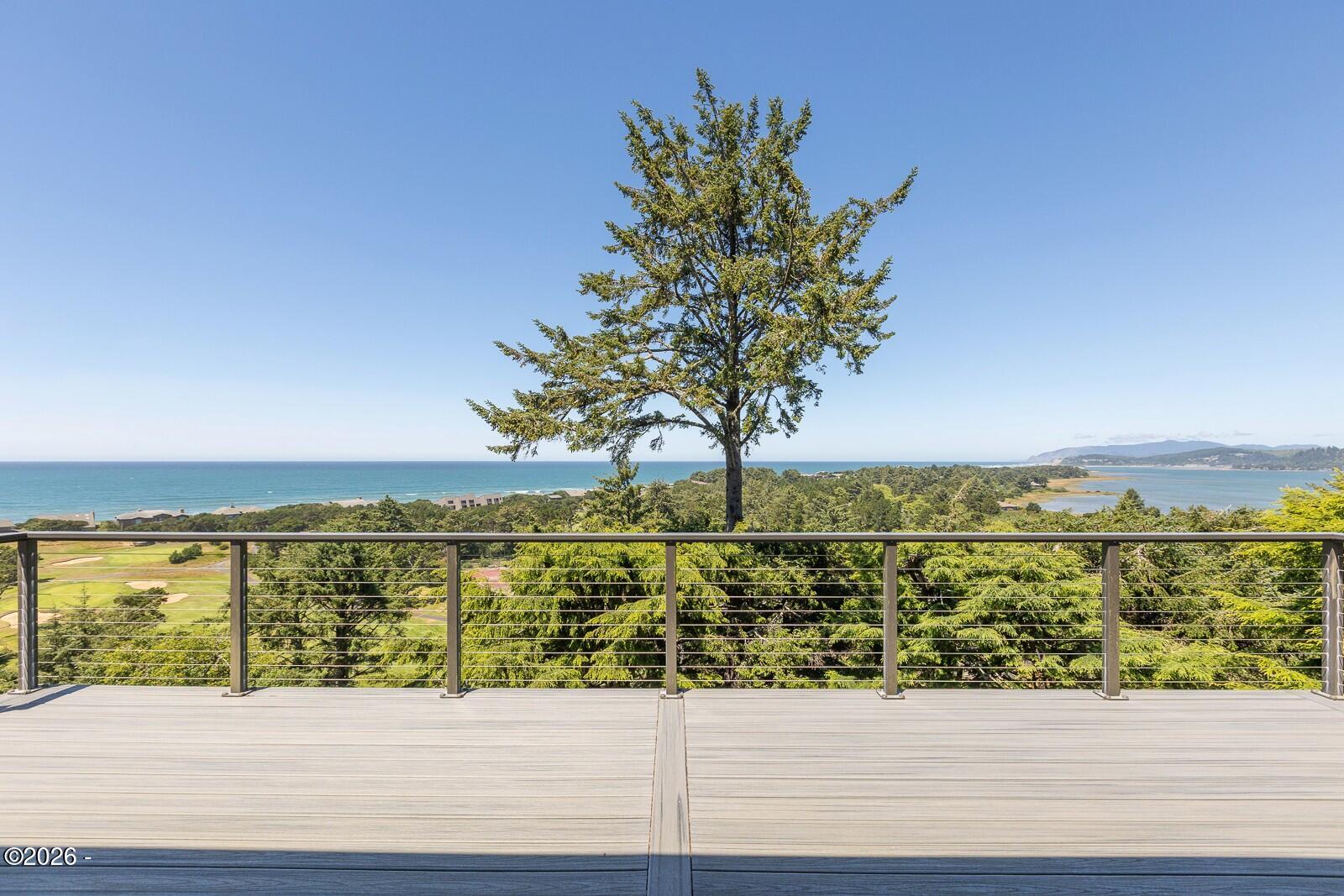 142 East Bay Point Road Gleneden Beach, OR 97388 - Photo 39 of 49 a view of ocean from a balcony