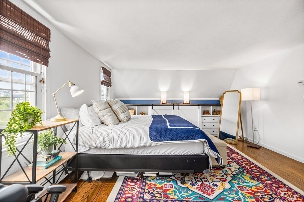 207 Tilden Road Scituate, MA 02066 - Photo 15 of 34 a living room with furniture and a rug