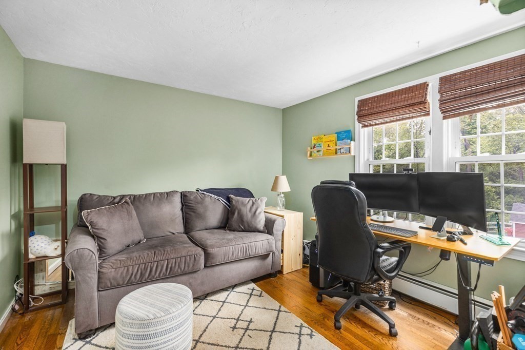 207 Tilden Road Scituate, MA 02066 - Photo 21 of 34 a work room with furniture lamp and window