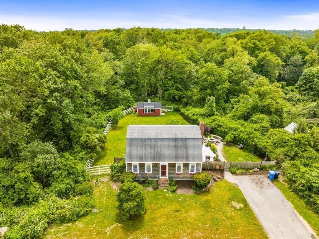 207 Tilden Road Scituate, MA 02066 - Photo 31 of 34 a swimming pool with trees in the background