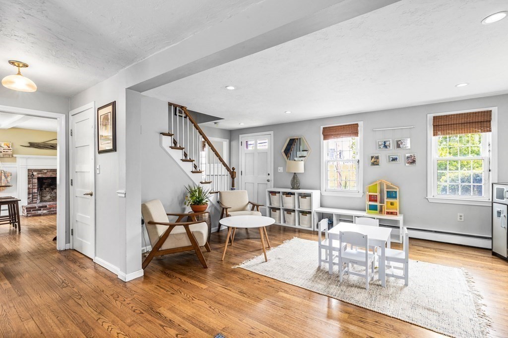 207 Tilden Road Scituate, MA 02066 - Photo 4 of 34 a living room with furniture and wooden floor