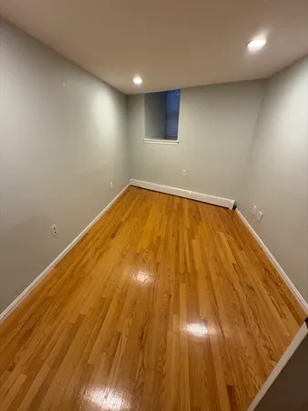 a bathroom with a toilet a sink and shower