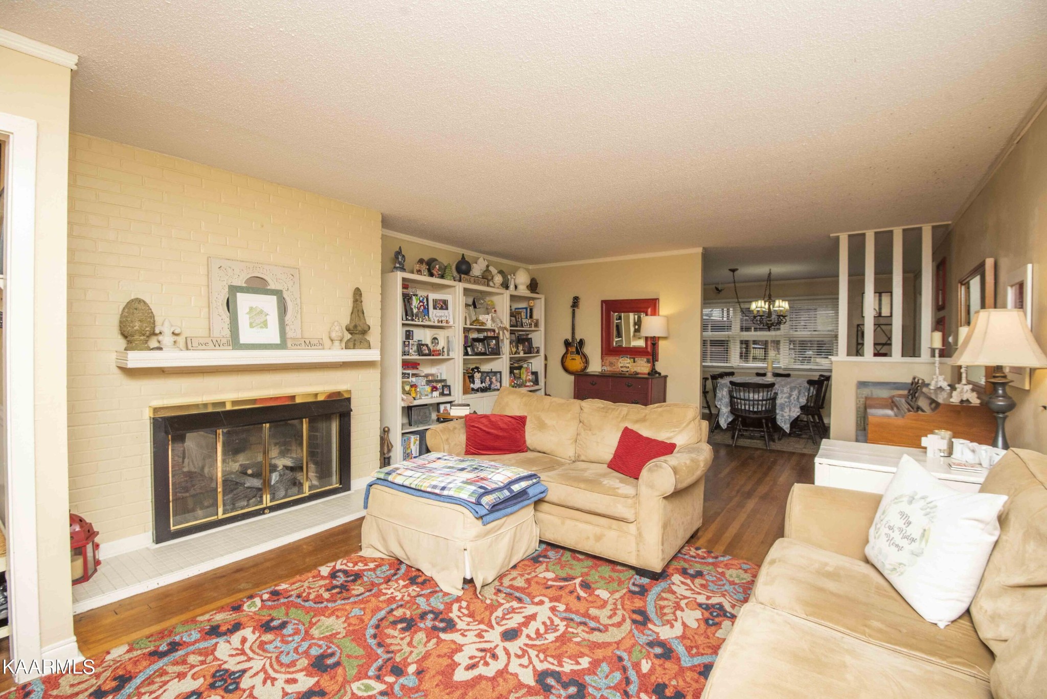 118 Tabor Road Oak Ridge, TN 37830 - Photo 13 of 44 a living room with furniture and a fireplace