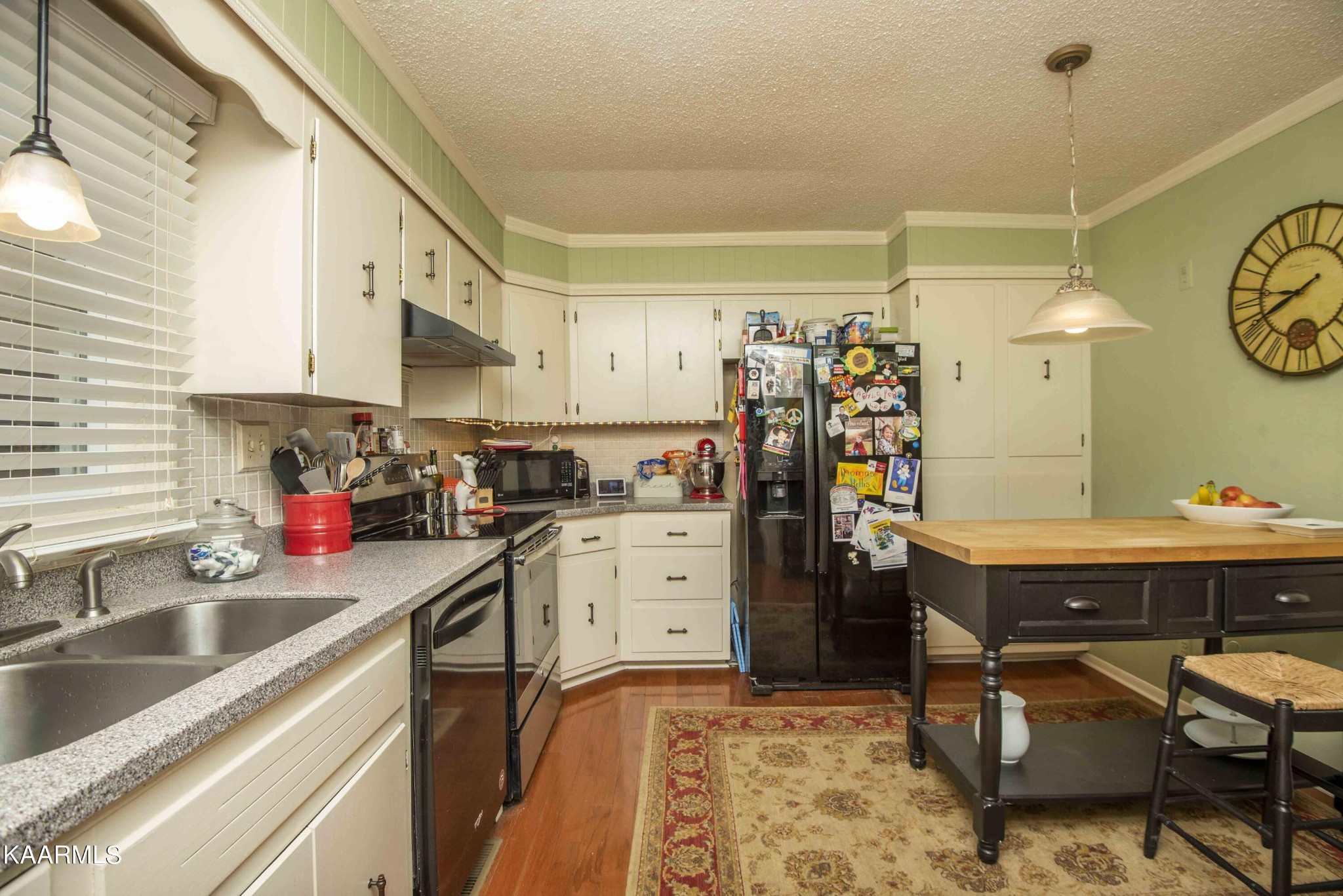 118 Tabor Road Oak Ridge, TN 37830 - Photo 29 of 44 a kitchen filled with stainless steel appliances a sink a stove a refrigerator and cabinets