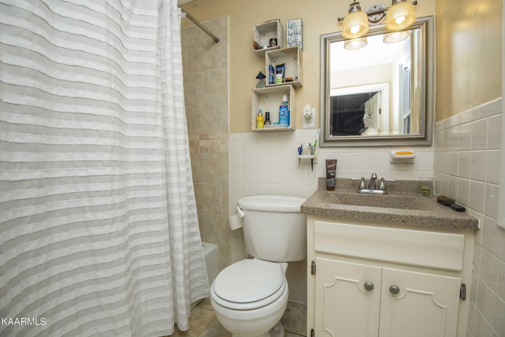 118 Tabor Road Oak Ridge, TN 37830 - Photo 33 of 44 a bathroom with a granite countertop toilet sink and mirror