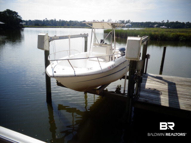 6674 Cook Road Foley, AL 36535 - Photo 37 of 45 Boat lift. Bulkhead new in 2014.