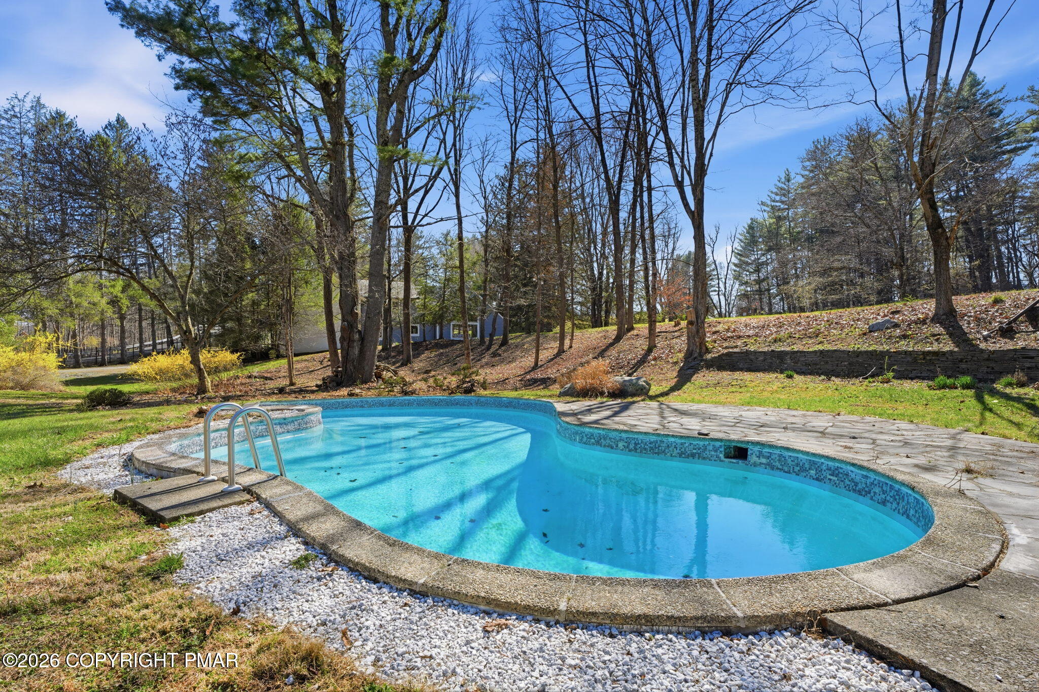 720 Stokes Mill Road East Stroudsburg, PA 18301 - Photo 61 of 87 a view of a swimming pool with sitting area