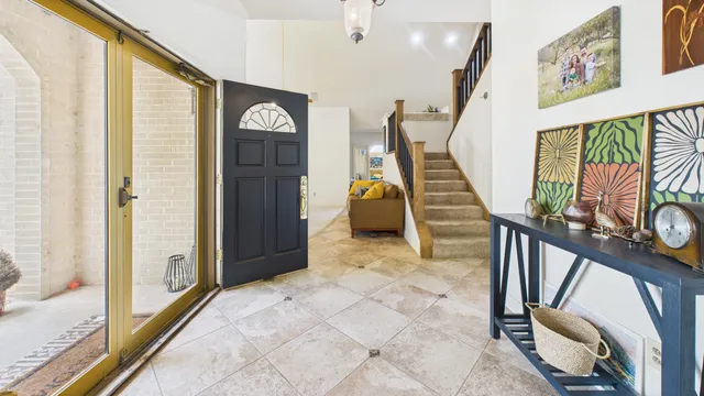 a view of living room with furniture and wooden floor