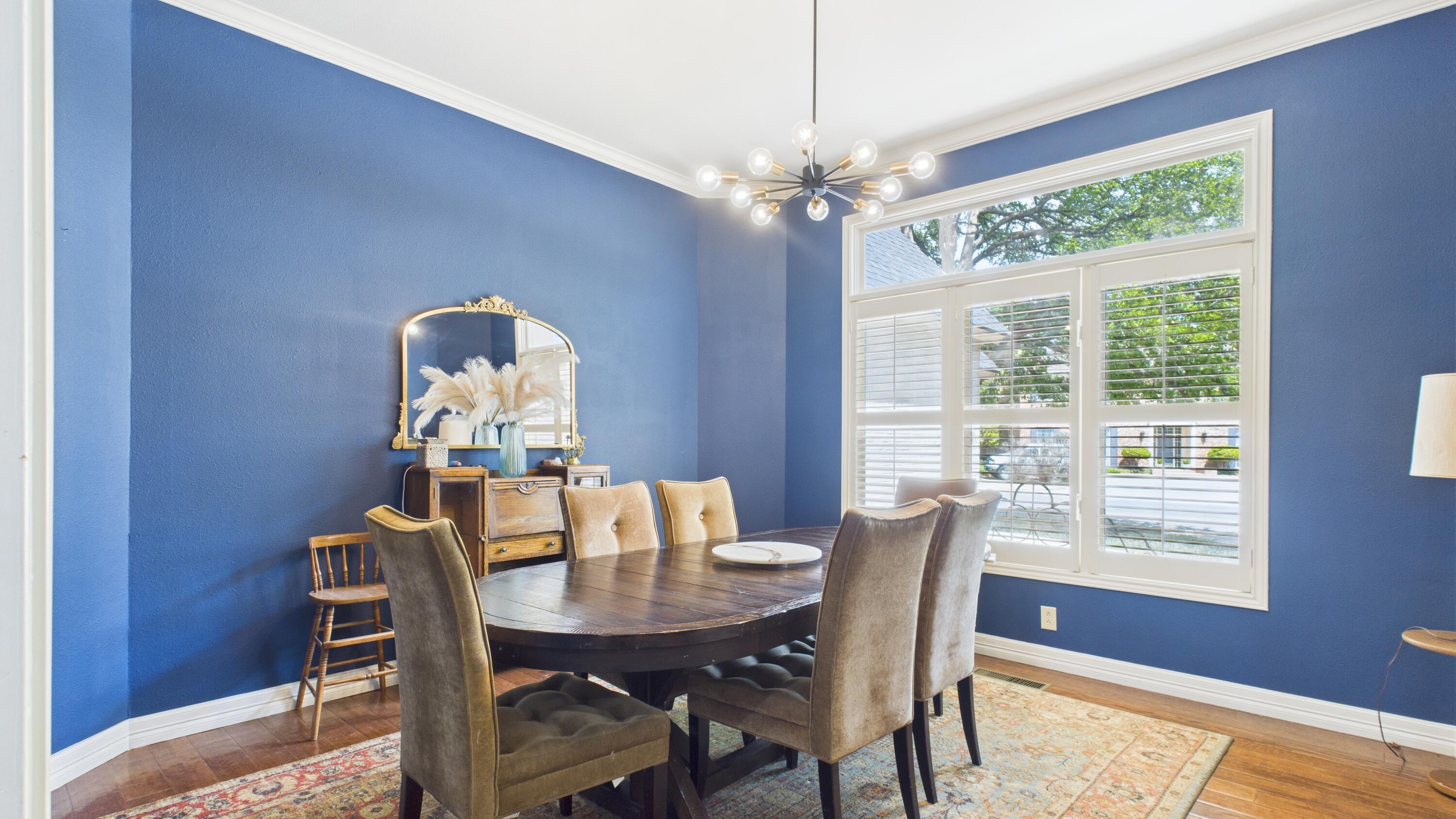 4615 94th Street Lubbock, TX 79424 - Photo 18 of 82 a view of a dining room with furniture window and outside view