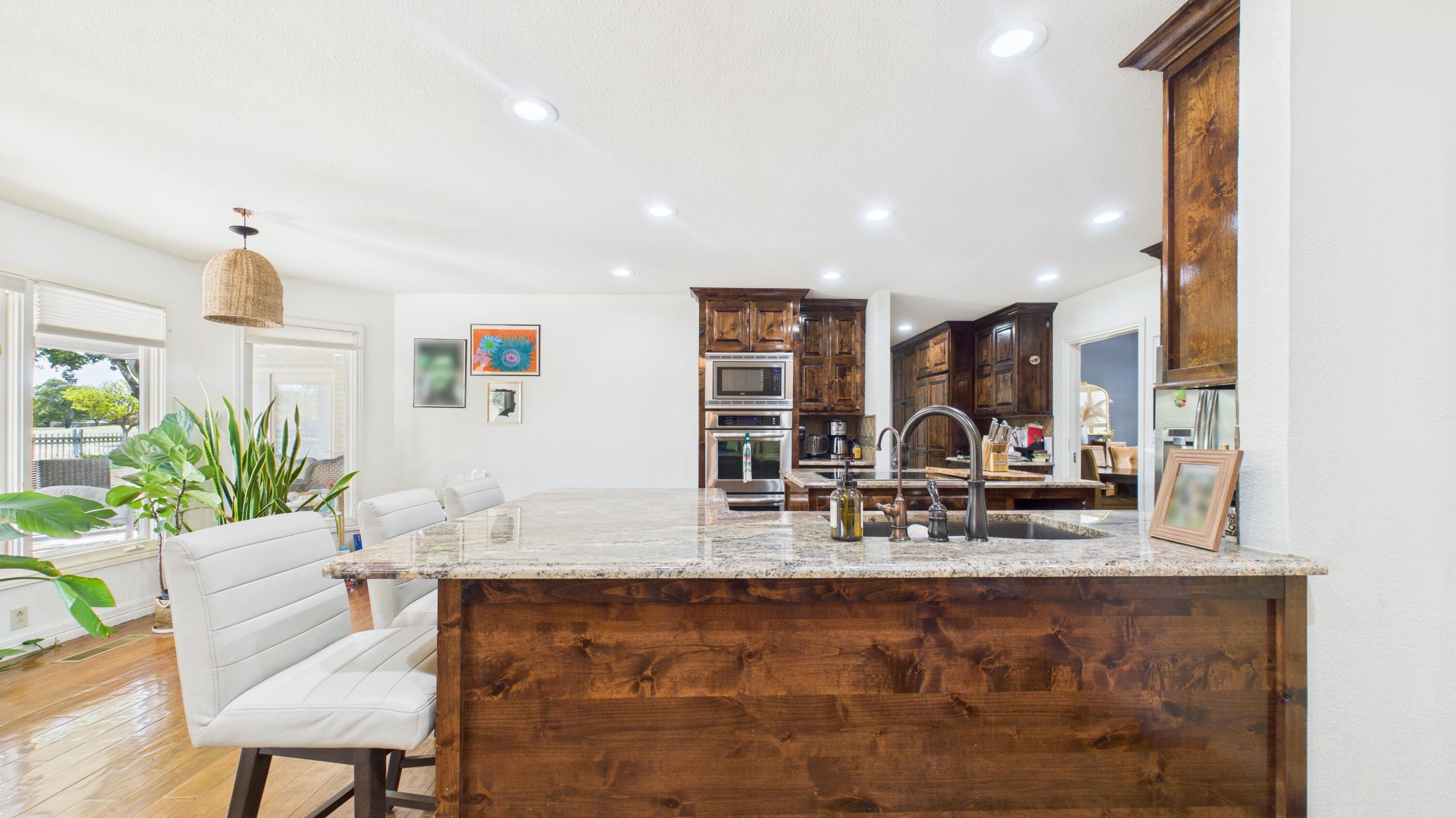 4615 94th Street Lubbock, TX 79424 - Photo 24 of 82 a view of living room with furniture and wooden floor