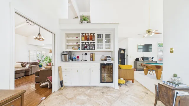 a view of a livingroom with furniture and windows