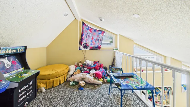 an aerial view of multiple house with yard