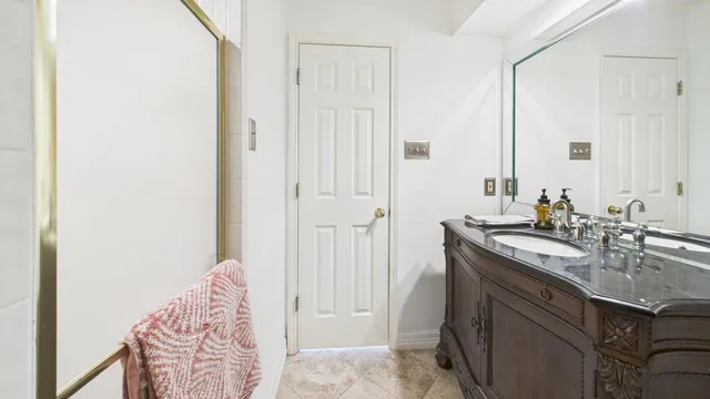 an aerial view of residential house with outdoor space and lake view
