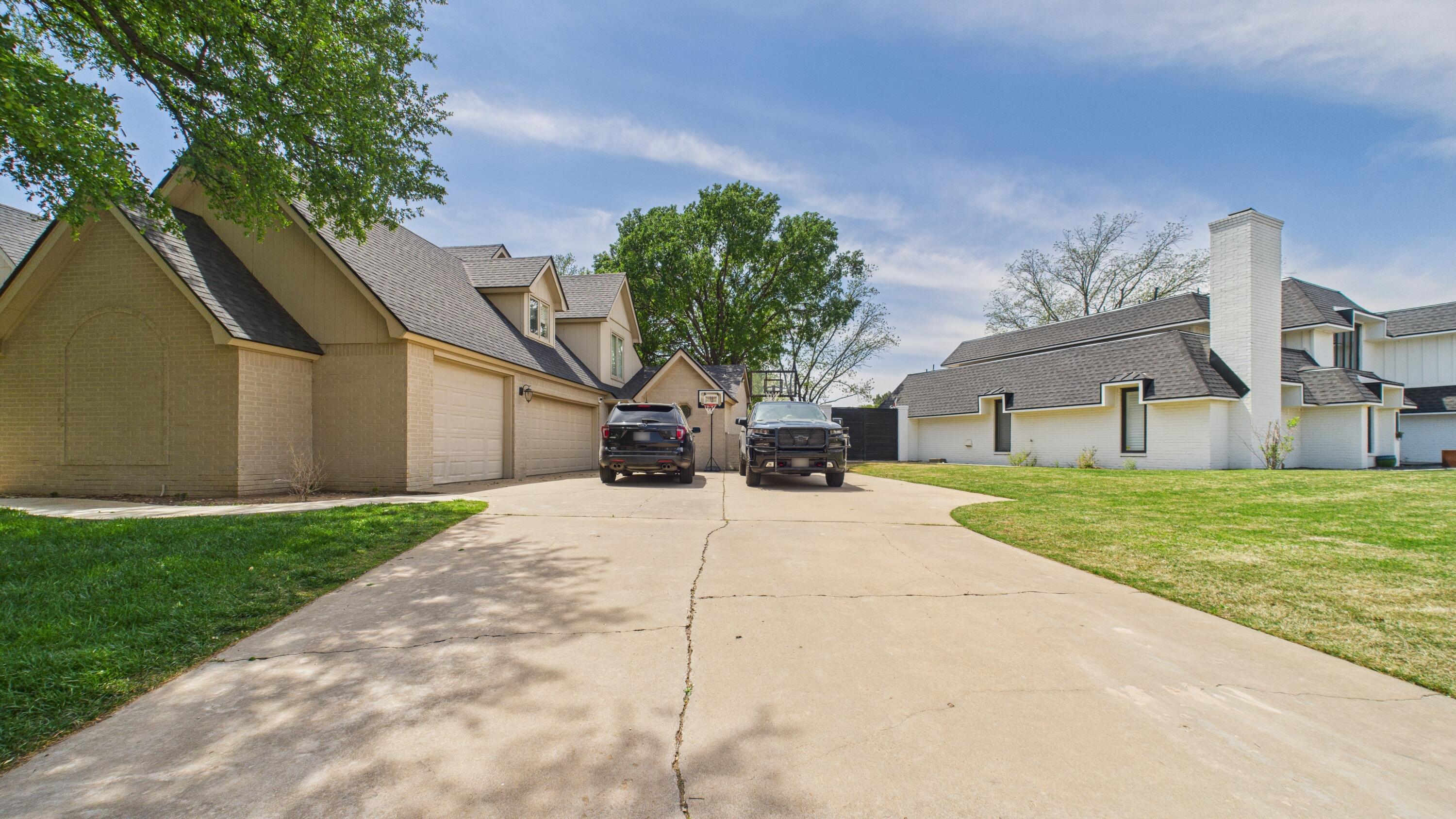 4615 94th Street Lubbock, TX 79424 - Photo 7 of 82 a house view with a outdoor space