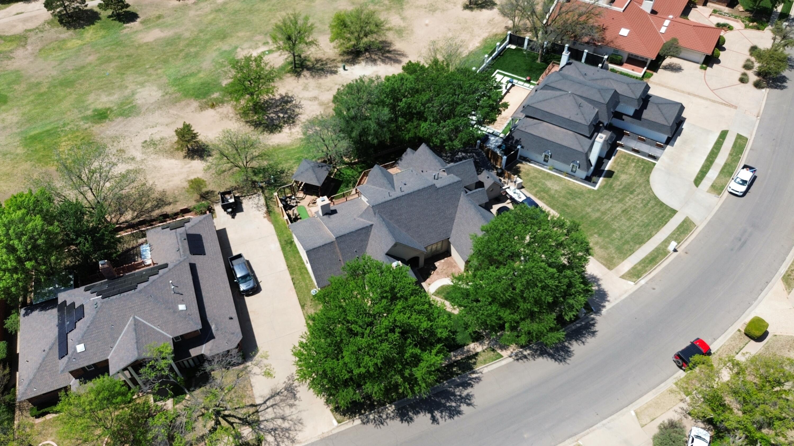 4615 94th Street Lubbock, TX 79424 - Photo 72 of 82 an aerial view of multiple houses with yard