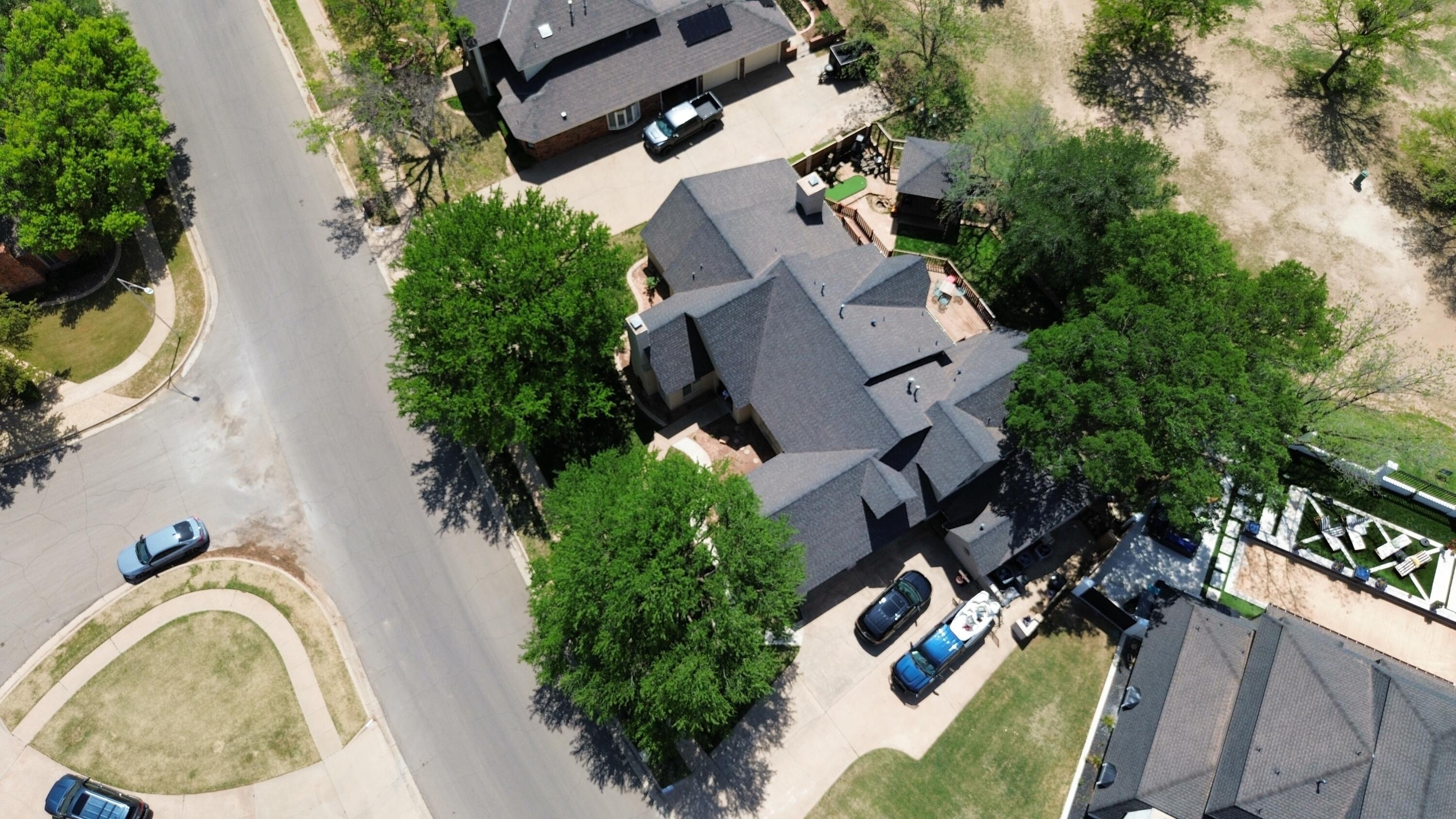 4615 94th Street Lubbock, TX 79424 - Photo 73 of 82 an aerial view of house with backyard space and garden