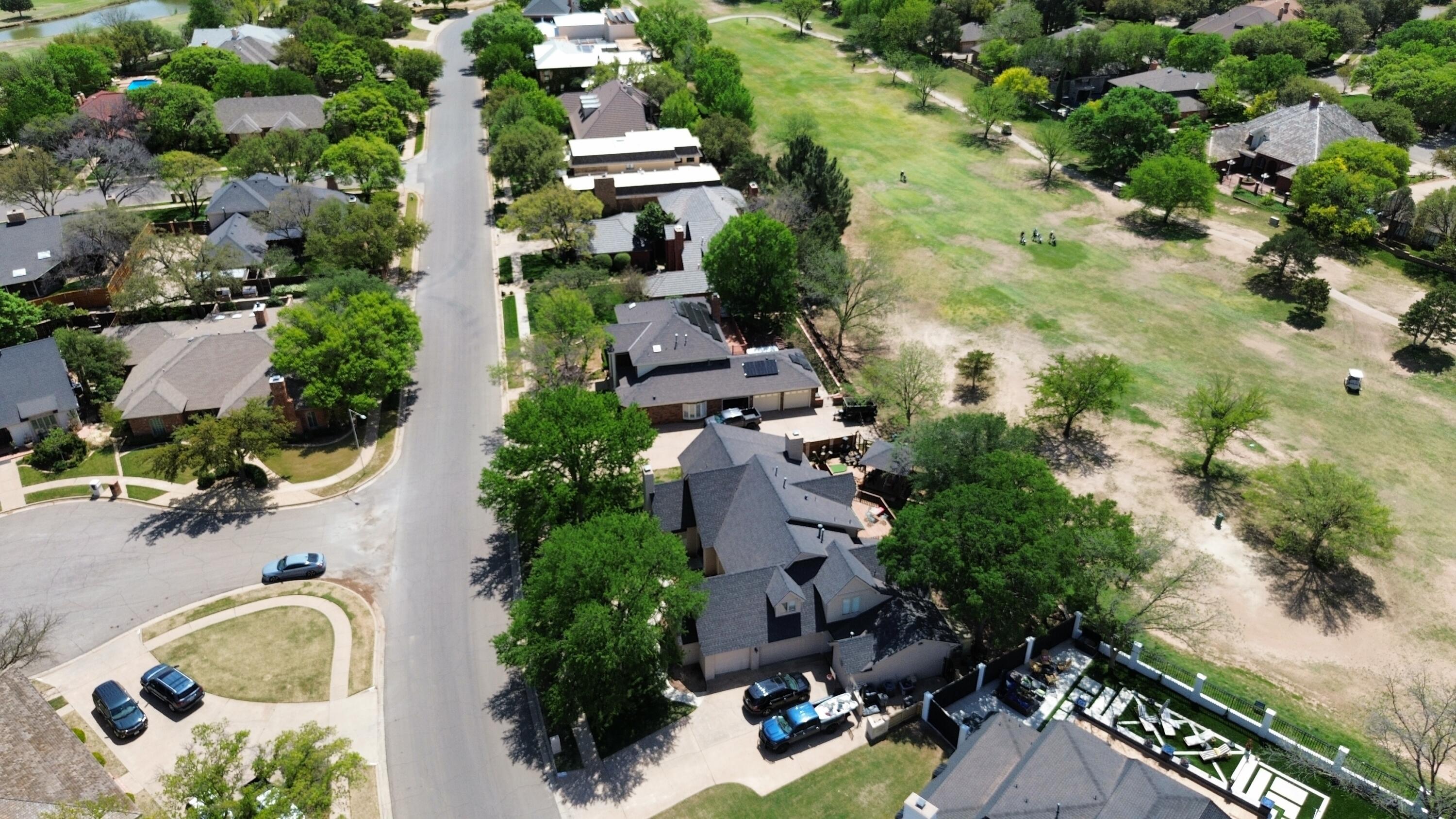 4615 94th Street Lubbock, TX 79424 - Photo 74 of 82 an aerial view of a house with swimming pool and outdoor seating