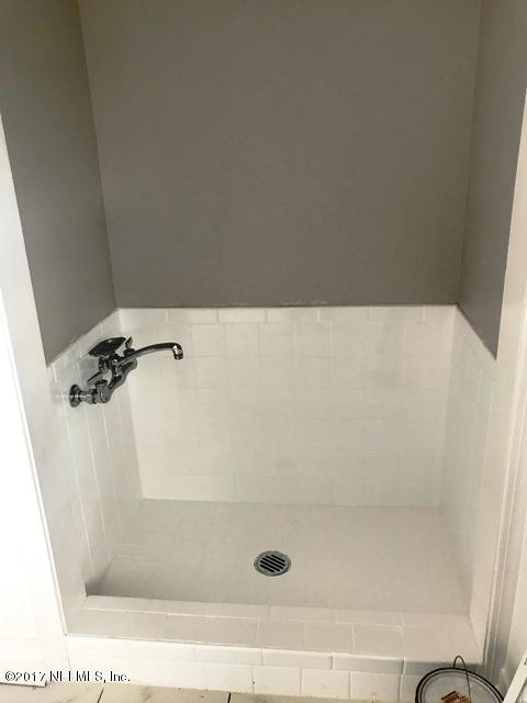 8112 Pine Lake Road Jacksonville, FL 32256 - Photo 34 of 65 dog bath in laundry