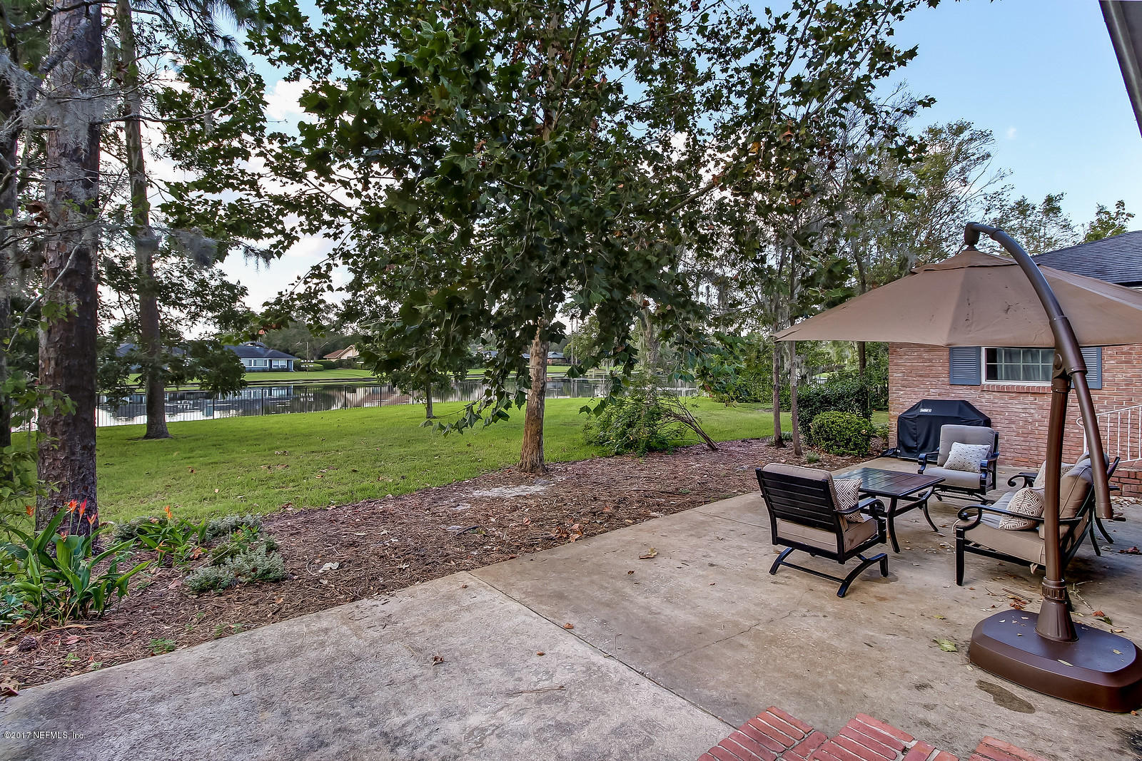 8112 Pine Lake Road Jacksonville, FL 32256 - Photo 41 of 65 patio to lakeview