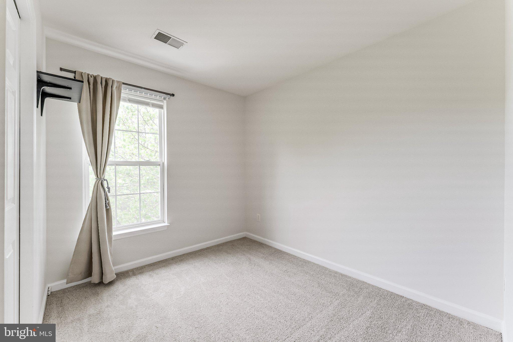 6414 Lureta Ann Lane Springfield, VA 22150 - Photo 24 of 44 an empty room with windows