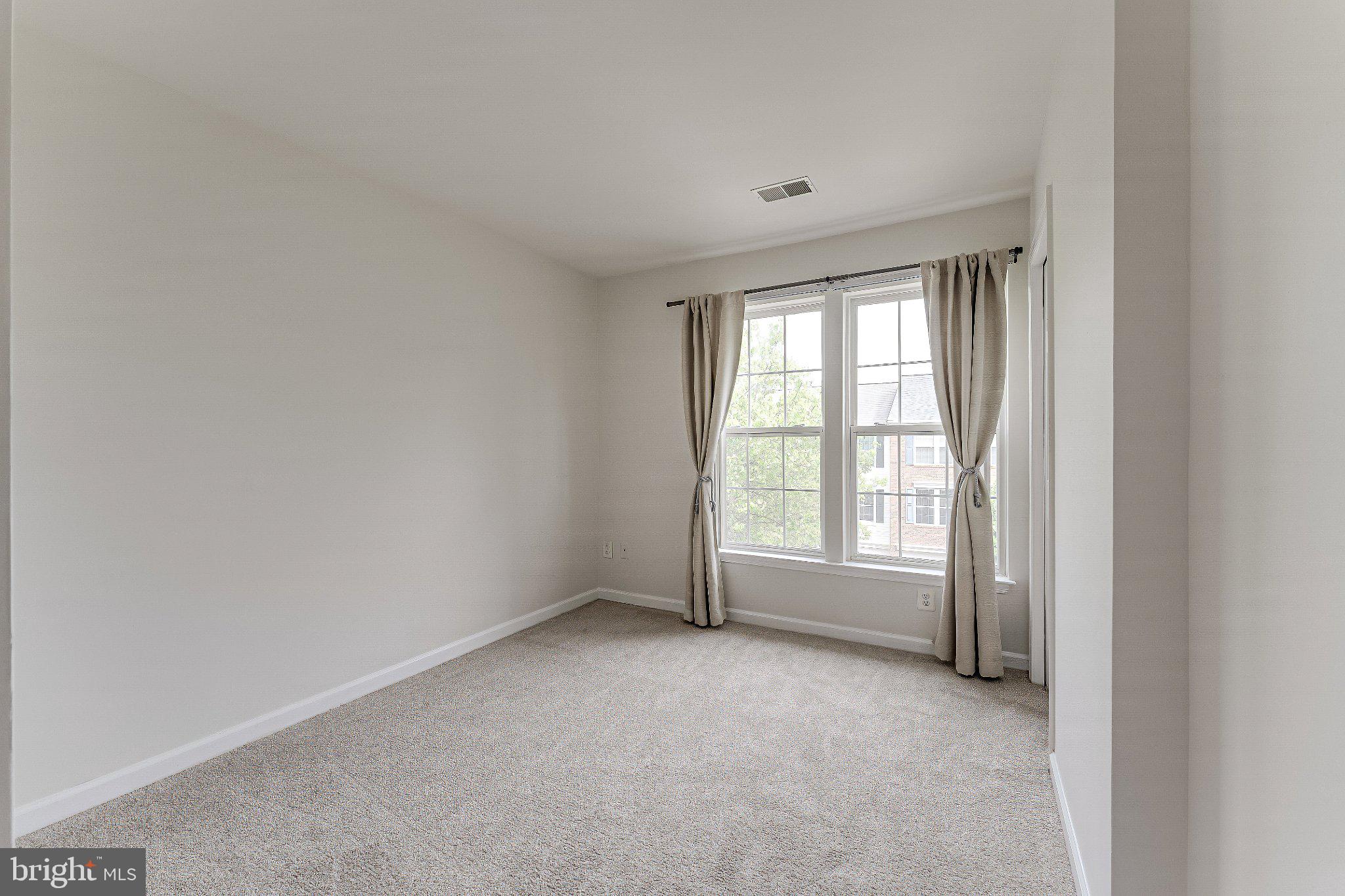 6414 Lureta Ann Lane Springfield, VA 22150 - Photo 26 of 44 an empty room with windows