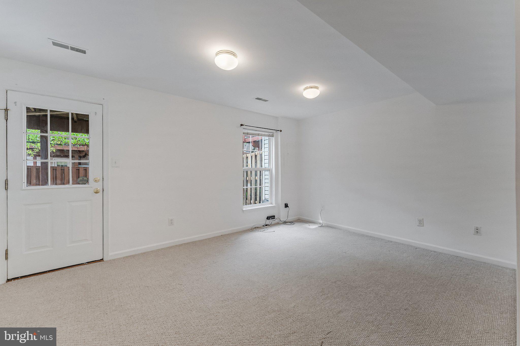 6414 Lureta Ann Lane Springfield, VA 22150 - Photo 28 of 44 an empty room with windows
