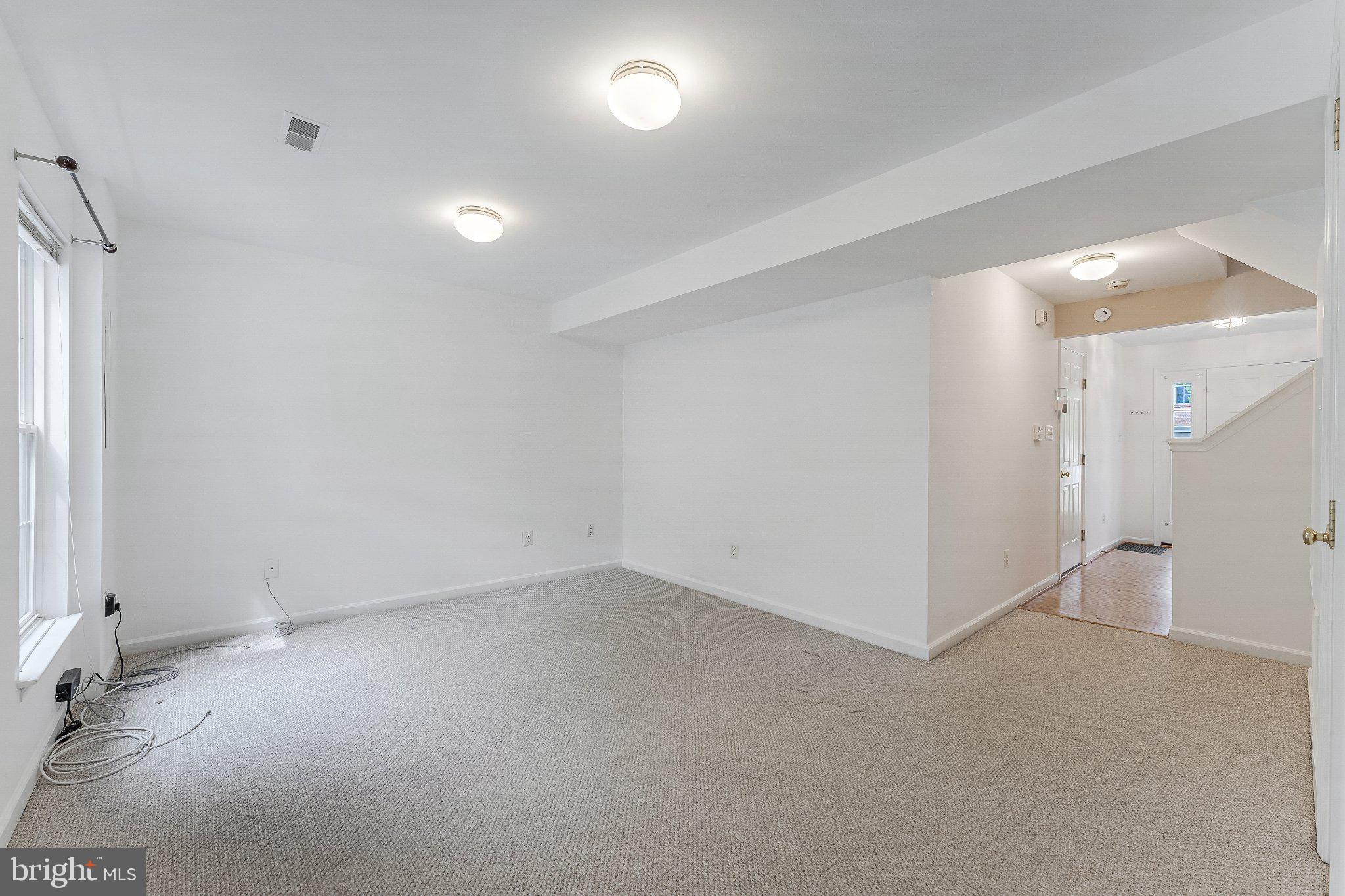 6414 Lureta Ann Lane Springfield, VA 22150 - Photo 31 of 44 an empty room with a natural light