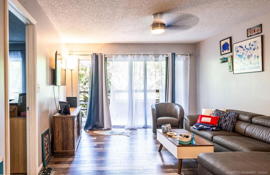 1900 South Kanner Highway, Unit 9202 Stuart, FL 34994 - Photo 1 of 55 a living room with furniture and a window