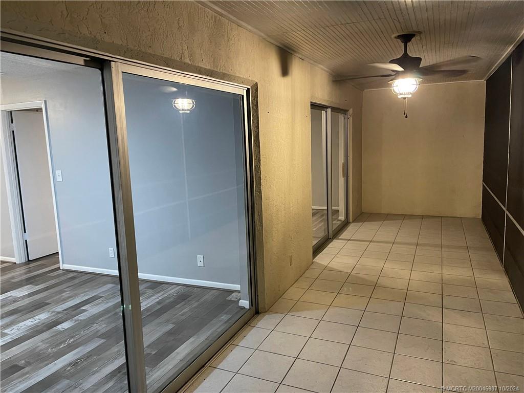 1900 South Kanner Highway, Unit 9202 Stuart, FL 34994 - Photo 28 of 55 a view of a hallway with wooden floor