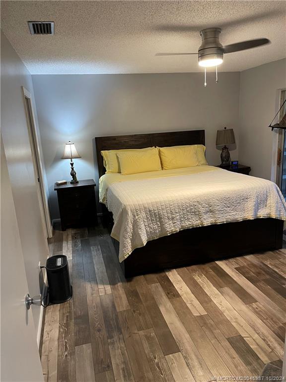 1900 South Kanner Highway, Unit 9202 Stuart, FL 34994 - Photo 31 of 55 a bedroom with a bed and a walk in closet